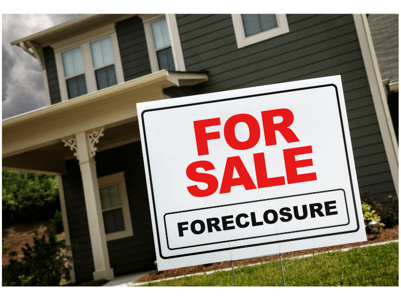 Foreclosure Sign in Front of Home